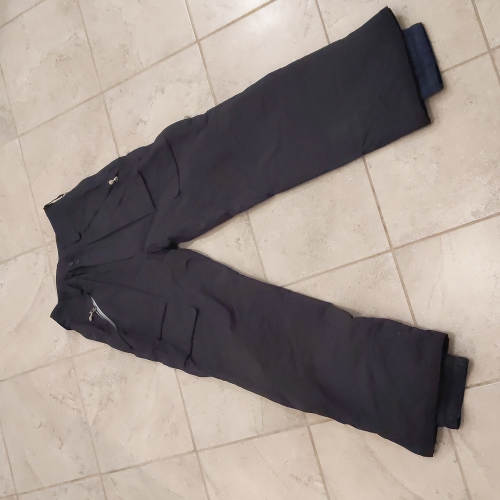 Size S Bonfire ski pants non-insulated vents at top zips at bottom, snow cuffs